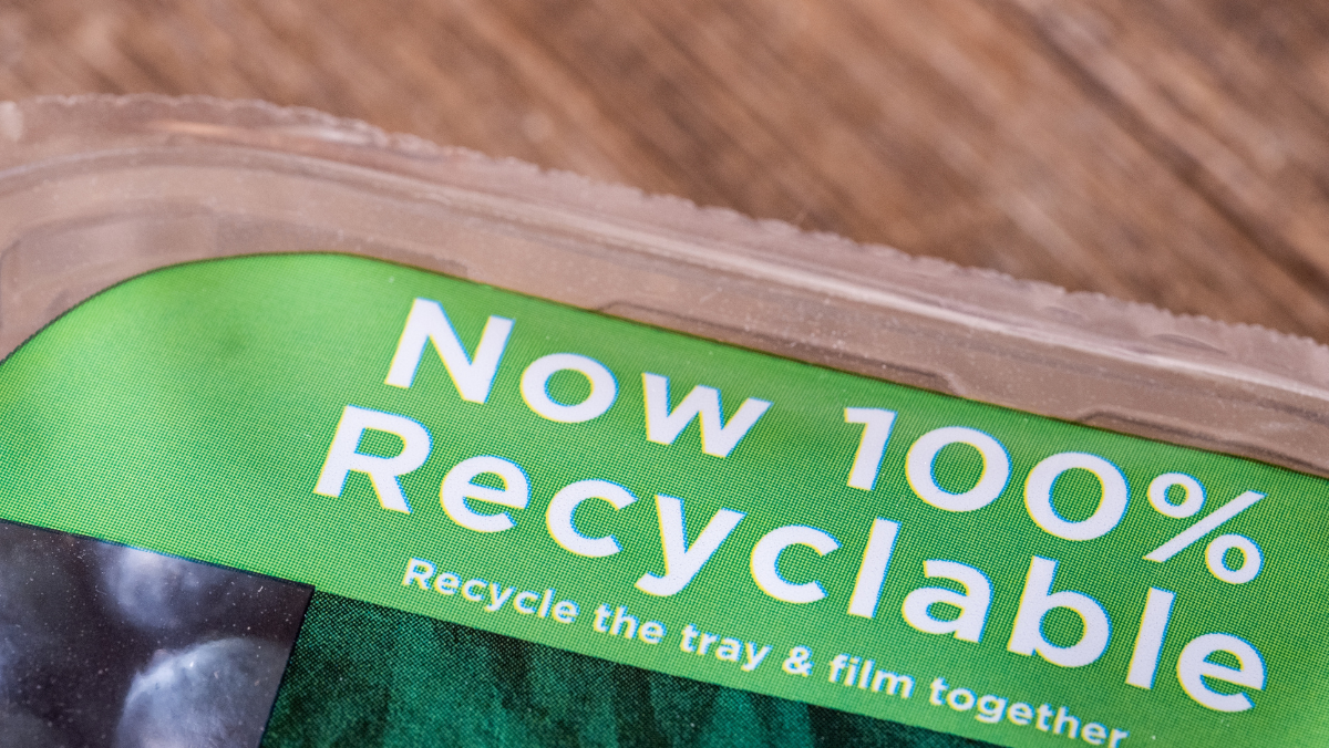 Closeup of packaging label showing Now 100% Recyclable message
