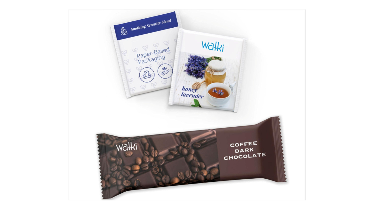 Paper-based food packaging samples including chocolate and tea sachets.